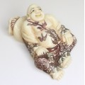 netsuke " Hotei ", de perioada Meiji. fildes natural. semnat Hanako.cca 1880